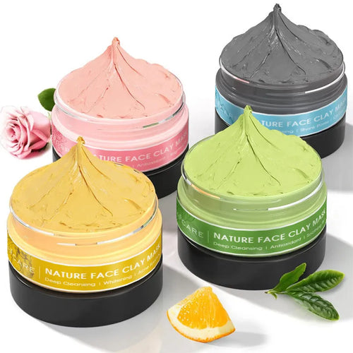 4 pack of Dead Sea mud, green tea, turmeric and rose clay face masks in 80ml pots on white background