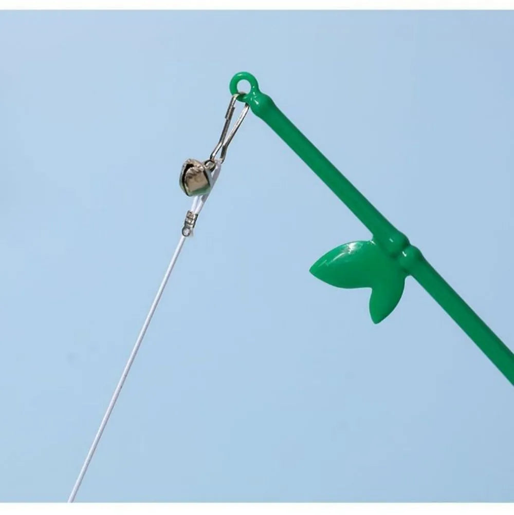 Interactive cat toy feather wand with green bells and feathers on a durable wand