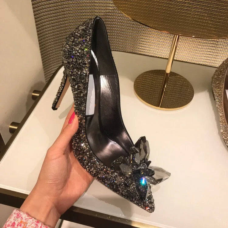 Women's gold pointed toe high heels with rhinestone and bow decoration on sequin cloth