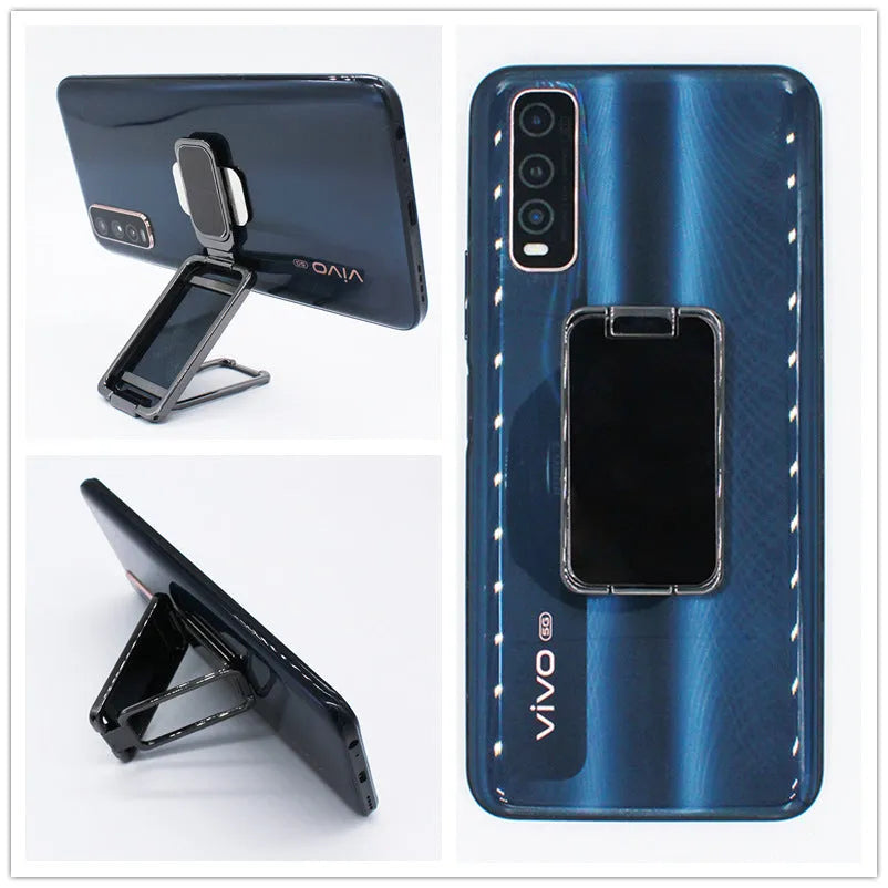 Foldable zinc alloy phone holder ring buckle in silver on a desk propping an iPhone at an angle.