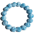 Blue handmade Bodhi bracelet with sea-pattern crystal stone and pearl accent in Maillard style.