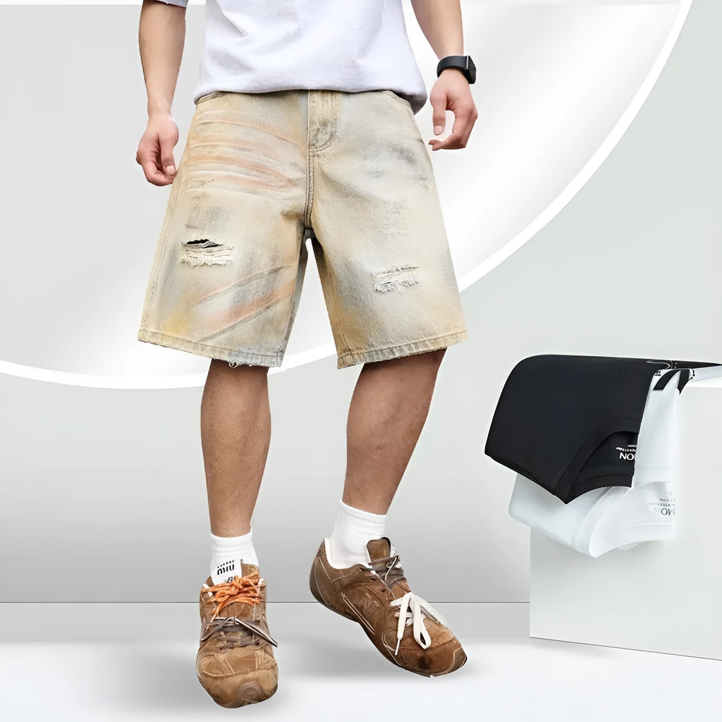 Men's light blue washed ripped straight-leg denim shorts on model front view