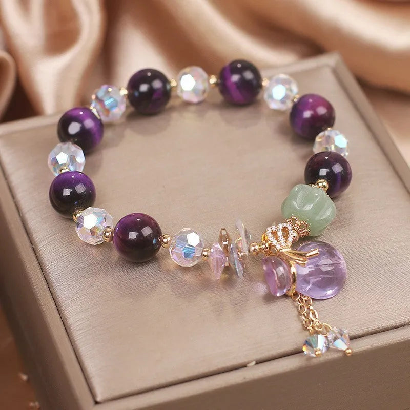 Women's retro transport bracelet with purple tigereye pendant, crystal and rhinestone accents