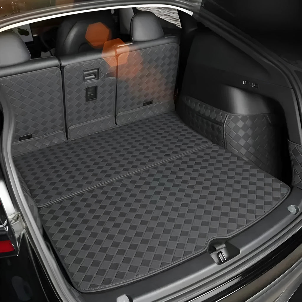 Leather trunk mat for Tesla Model 3 in black with buckle fitting lying in boot