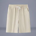 Cotton and linen cropped casual trousers in a solid colour with a drawstring waist.