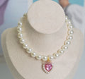 Pearl necklace love gem cat collar in single layer pink on a light background