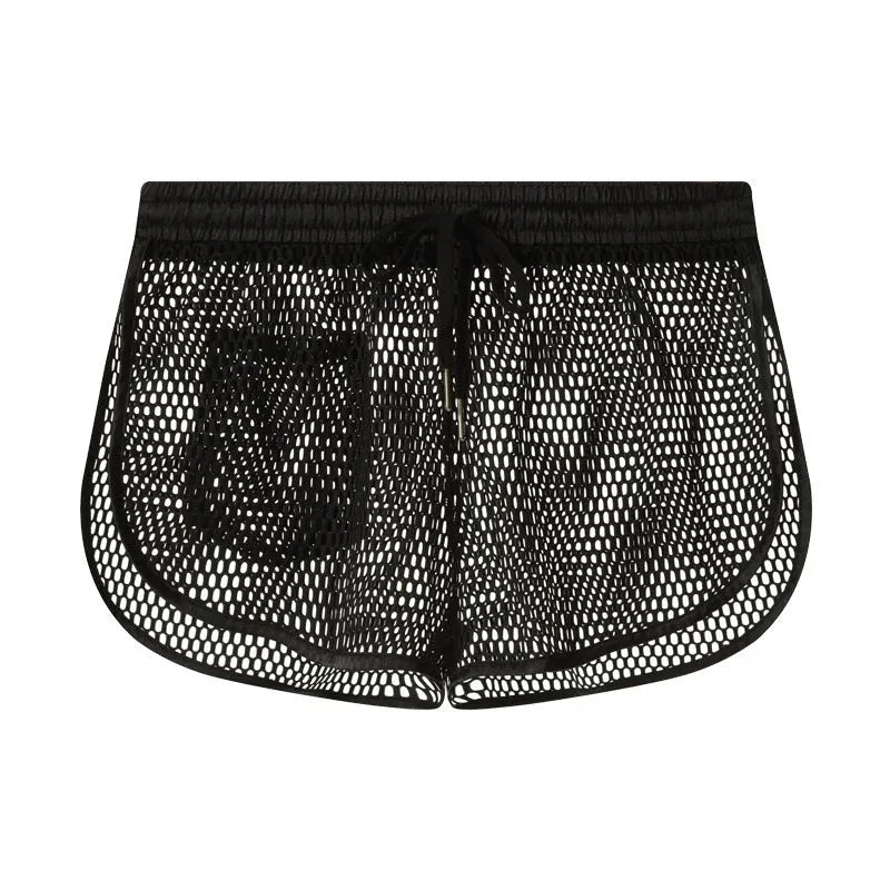 Men's loose breathable polyester boxers in solid colour, black, front view on plain background