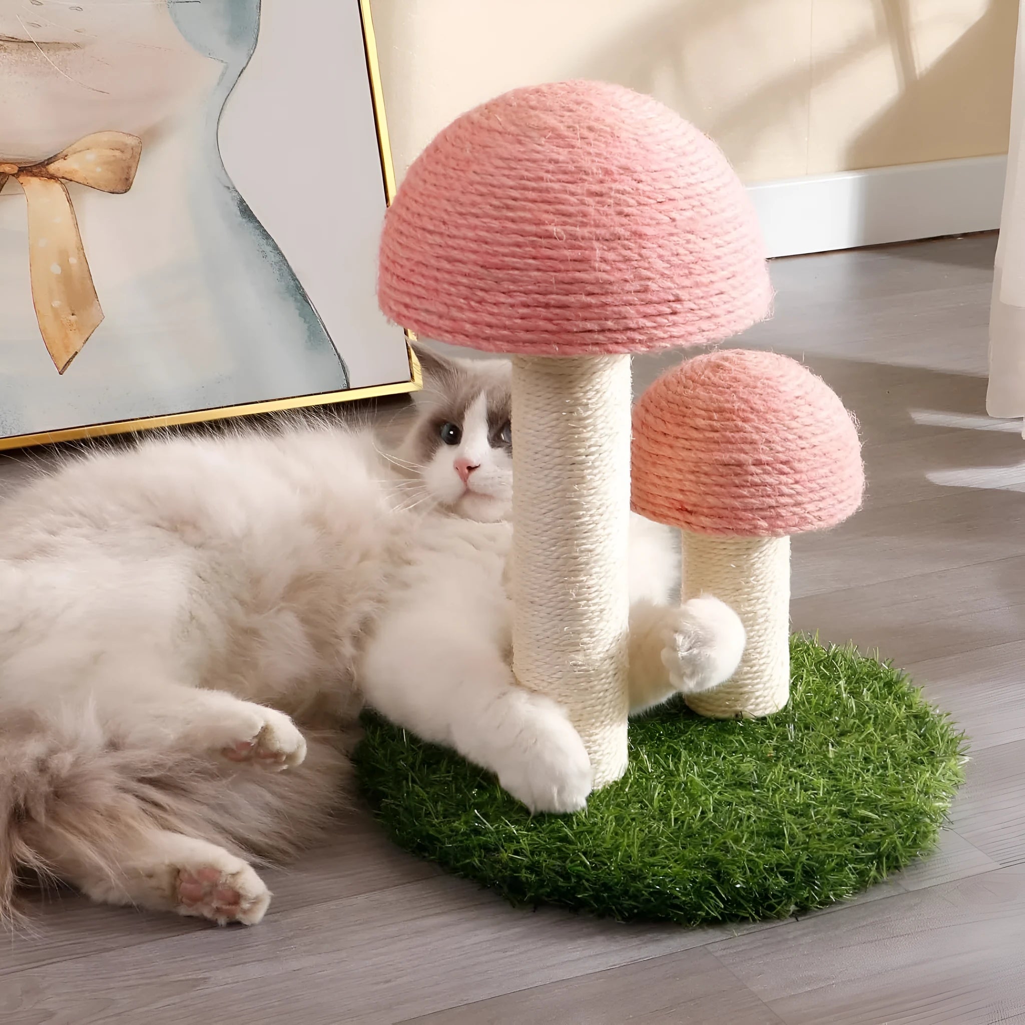 Pink mushroom-shaped cat scratching post with sisal caps for kittens and small cats