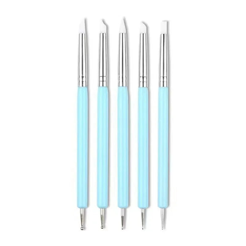 Five blue silicone double point electric drill pens for manicure painting set on light background