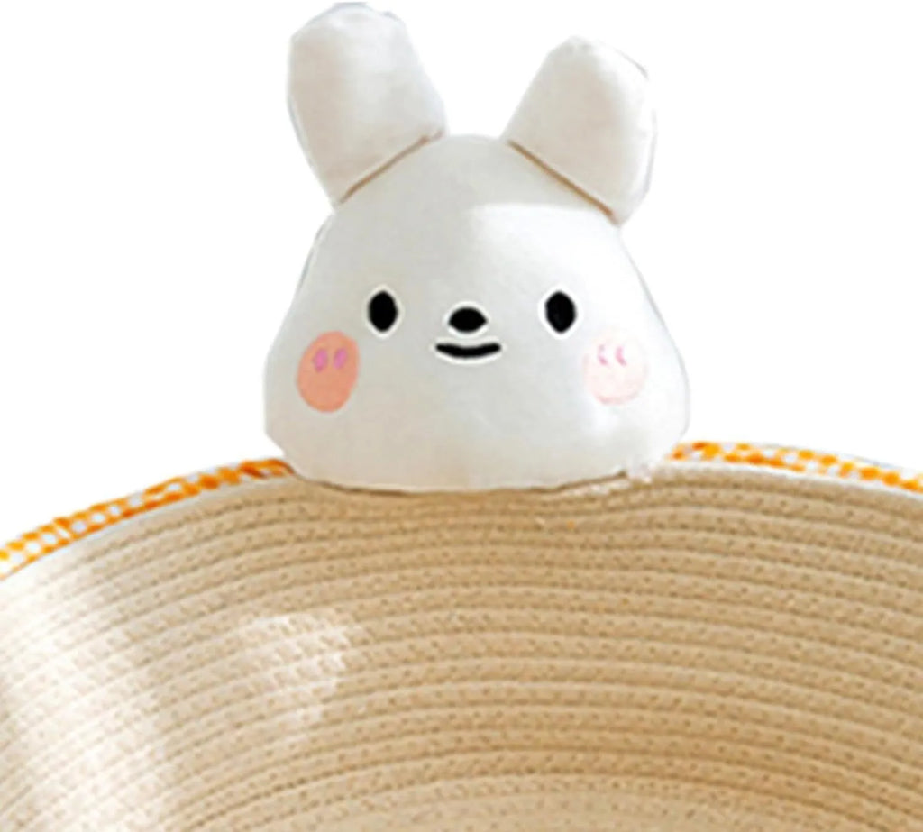 Woven cotton rope cat bed and scratching board basket shown in a home setting.