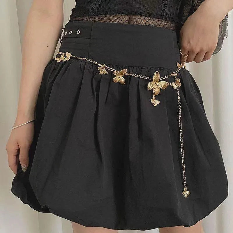 Golden butterfly alloy waist chain showing 104cm length and 40cm width measurement