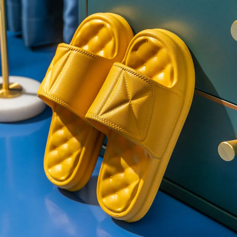 Pair of thick EVA bathroom slippers with textured anti-slip sole in a choice of five colours.