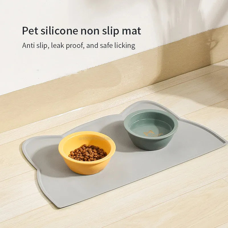 Waterproof silicone pet feeding mat in blue for dog or cat, 44x24cm, with a cat head shape