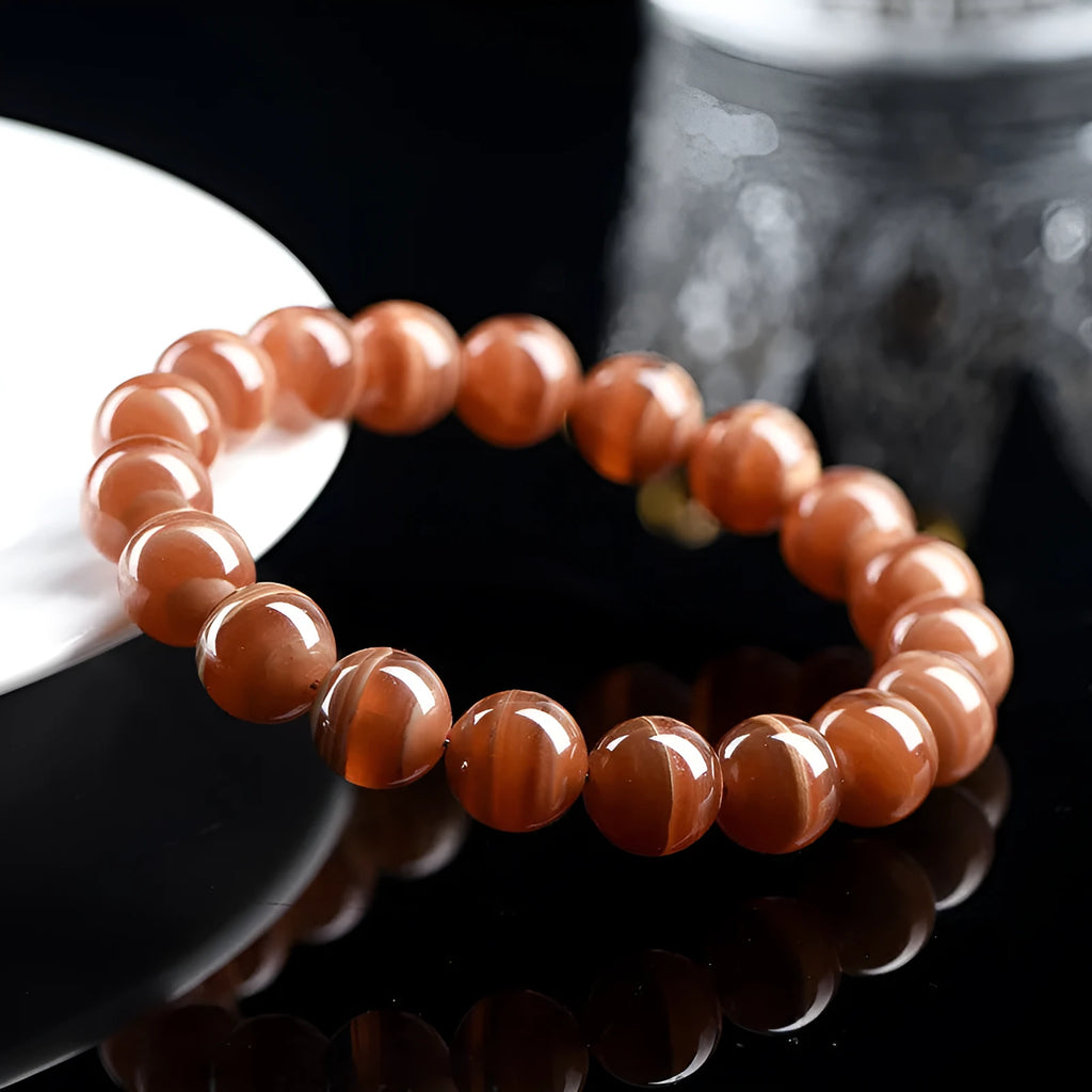 Natural Peruvian old mine rhodochrosite round bead bracelet with geometric design