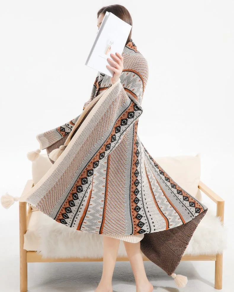 Bohemian style acrylic sofa throw blanket with tassel trim in a geometric pattern colour
