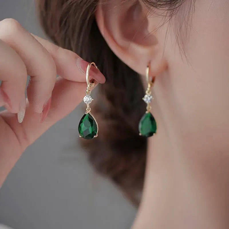 Geometric teardrop earrings in emerald green colour with alloy construction