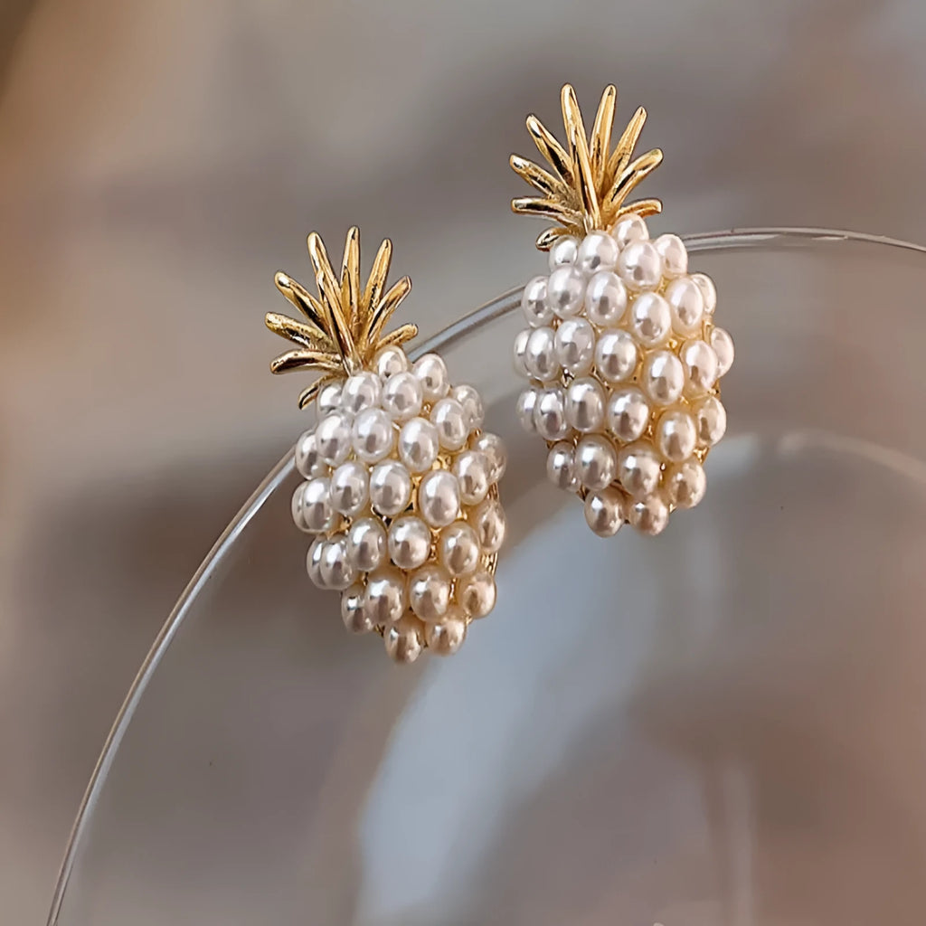 Korean style pineapple and starfish pearl earrings with electroplated alloy construction and artificial gem accents.