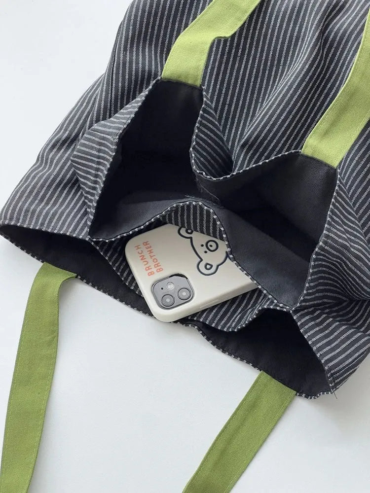 Canvas tote shoulder bag in black gray plaid with multi-layer compartments and lining cloth