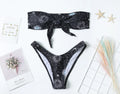 Black bikini print one-piece swimsuit with backless design for women