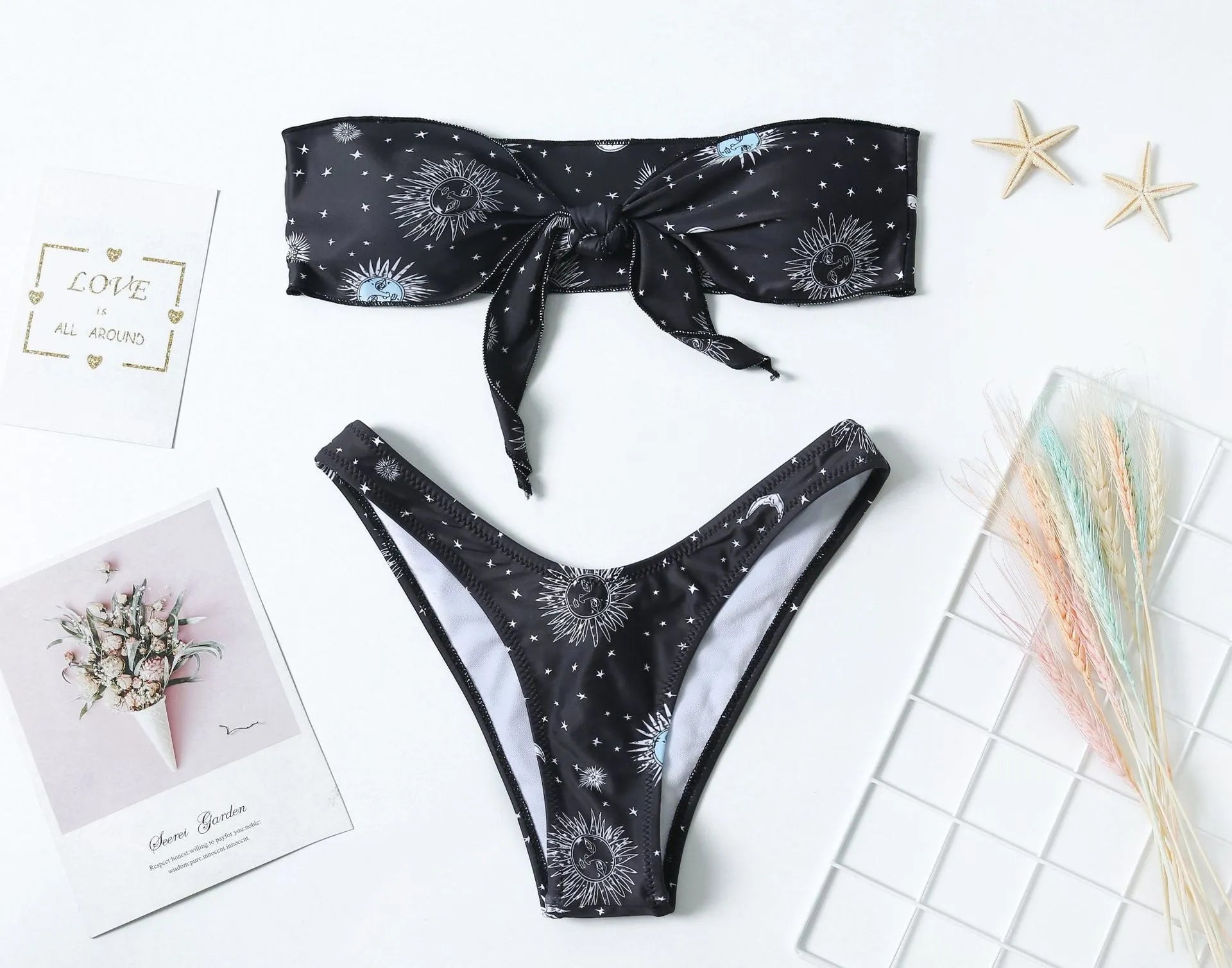 Black bikini print one-piece swimsuit with backless design for women