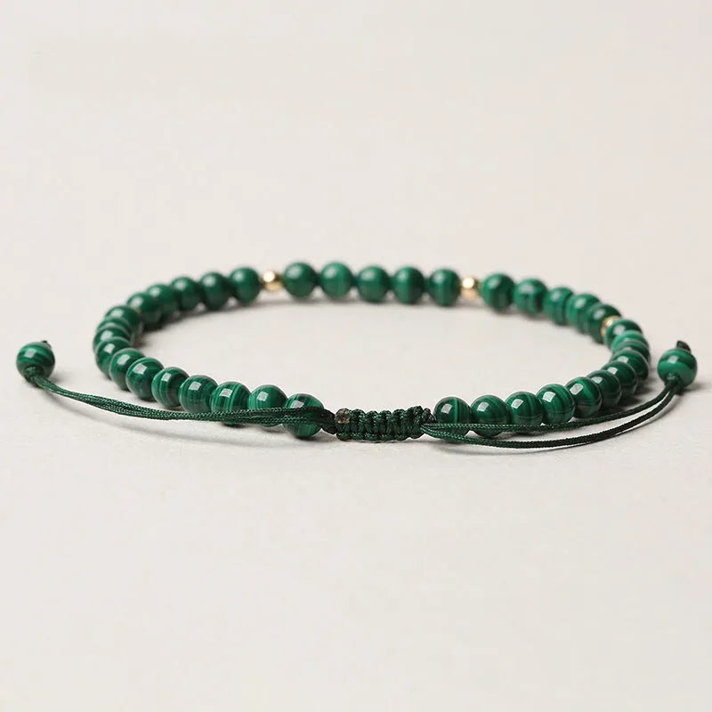 Natural malachite crystal bracelet for women with hand woven golden balls and textured stone beads