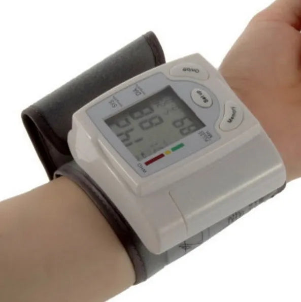 Grey portable wrist blood pressure monitor model C205L9 with display and cuff