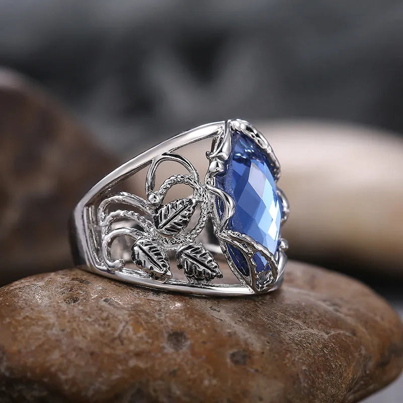 Blue F203 crystal inlay ring for women in alloy geometric horse eye shape, sizes 6 to 10