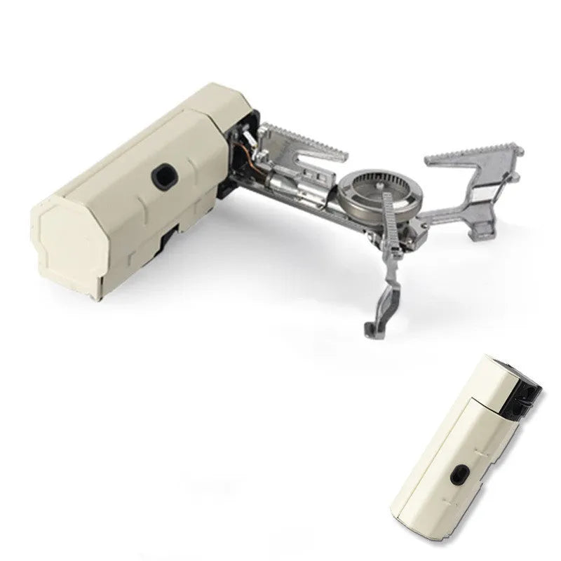 Green folding camping gas stove with burner, serrated bracket, and anti-slip feet on a tabletop