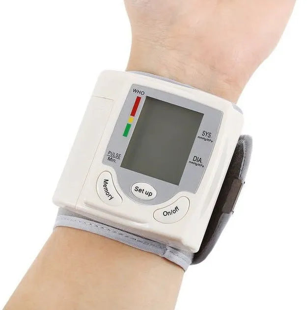 Grey portable wrist blood pressure monitor model C205L9 with display and cuff
