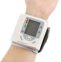 Grey portable wrist blood pressure monitor model C205L9 with display and cuff