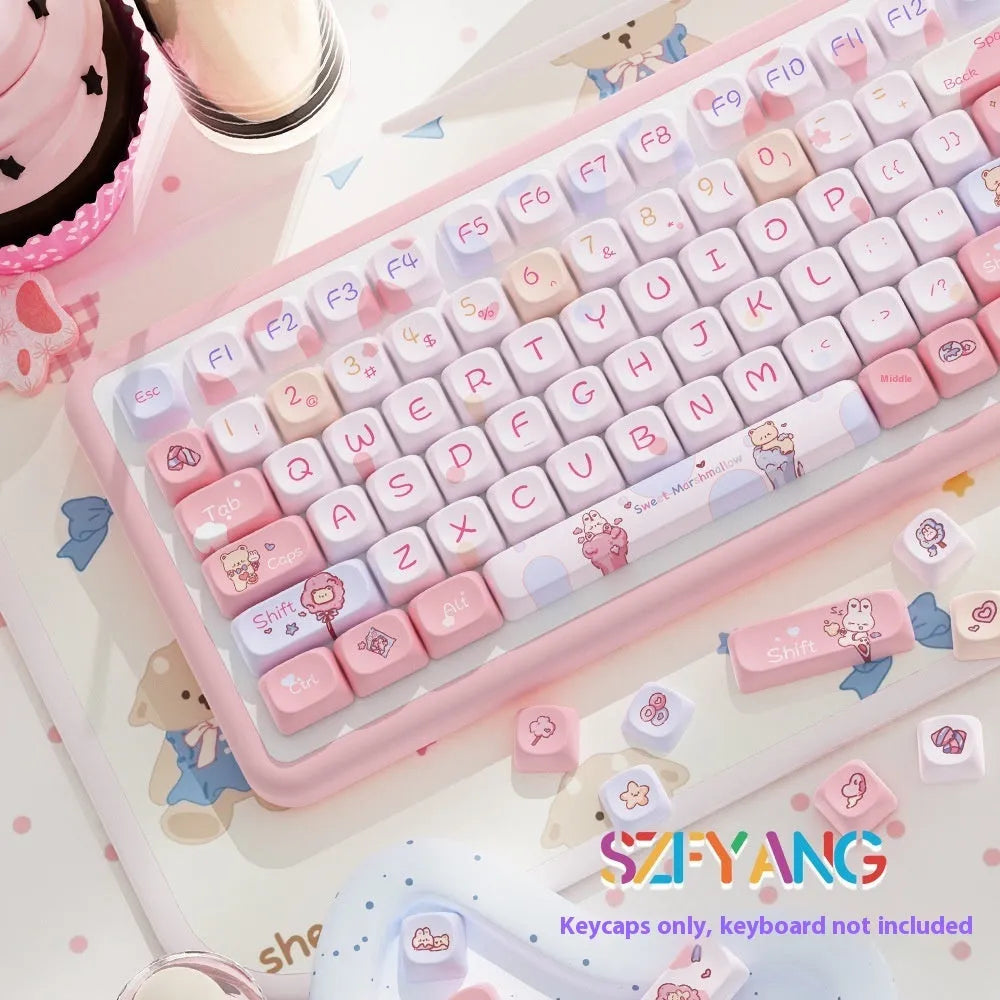 Sweet cotton candy coloured mechanical keyboard keycap set in a box.
