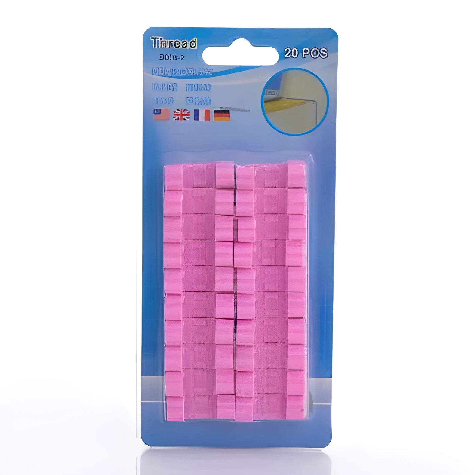 Self-adhesive wire cable organizer clips in various colours on a white wall holding cables