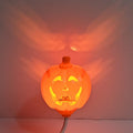 Plastic pumpkin lamp with USB cable, purple or yellow light option, 8.3cm wide by 22cm tall