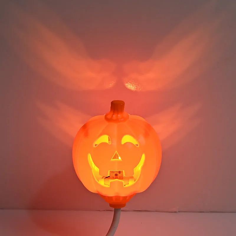 Plastic pumpkin lamp with USB cable, purple or yellow light option, 8.3cm wide by 22cm tall