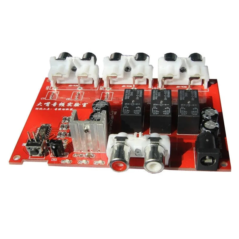 Silver audio source switch with infrared remote control and key switch on front panel, aluminium housing