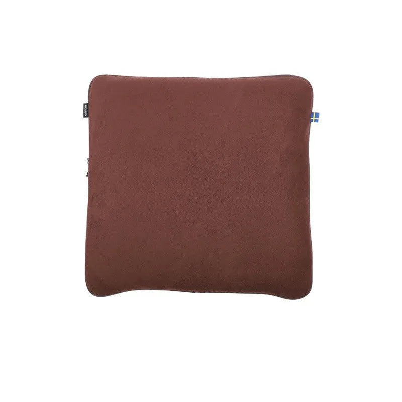 Minimalist brown synthetic fibre headrest cushion and neck pillow for a Volvo car seat.