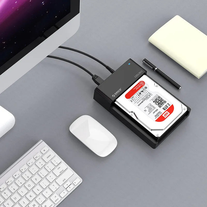 Black universal SATA hard disk enclosure for 2.5 and 3.5 inch drives with USB cable