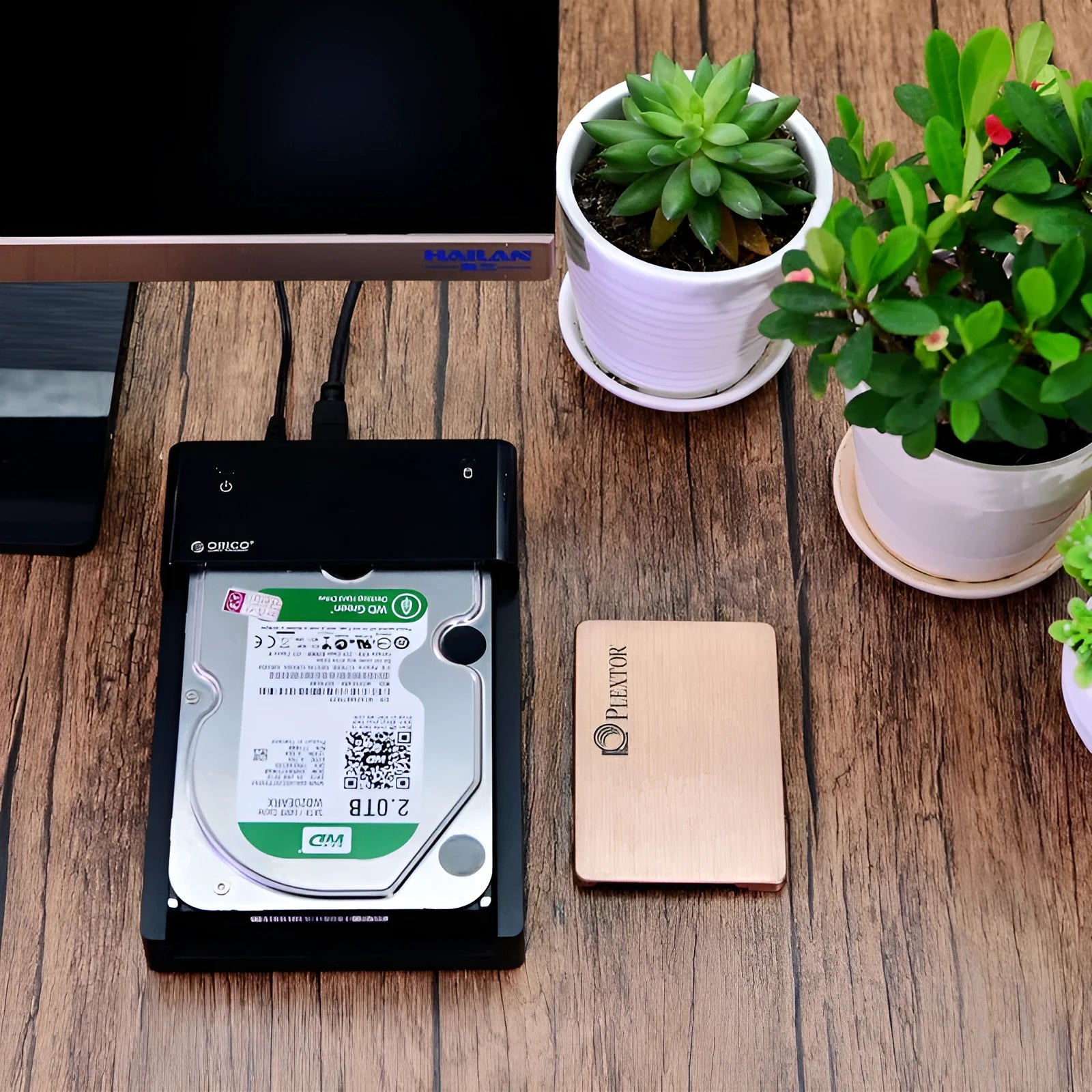 Black universal SATA hard disk enclosure for 2.5 and 3.5 inch drives with USB cable