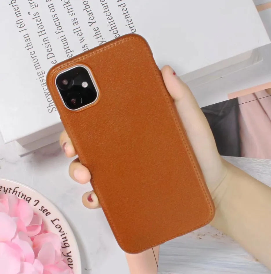 Black leather-style TPU phone case for iPhone 11 Pro Max with precise cutouts for camera and buttons