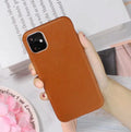 Black leather-style TPU phone case for iPhone 11 Pro Max with precise cutouts for camera and buttons