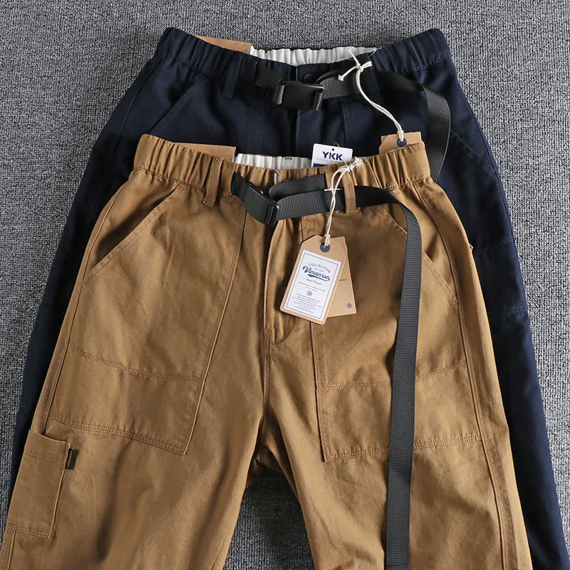 Men's khaki work trousers with a NI buckle belt closure and straight leg