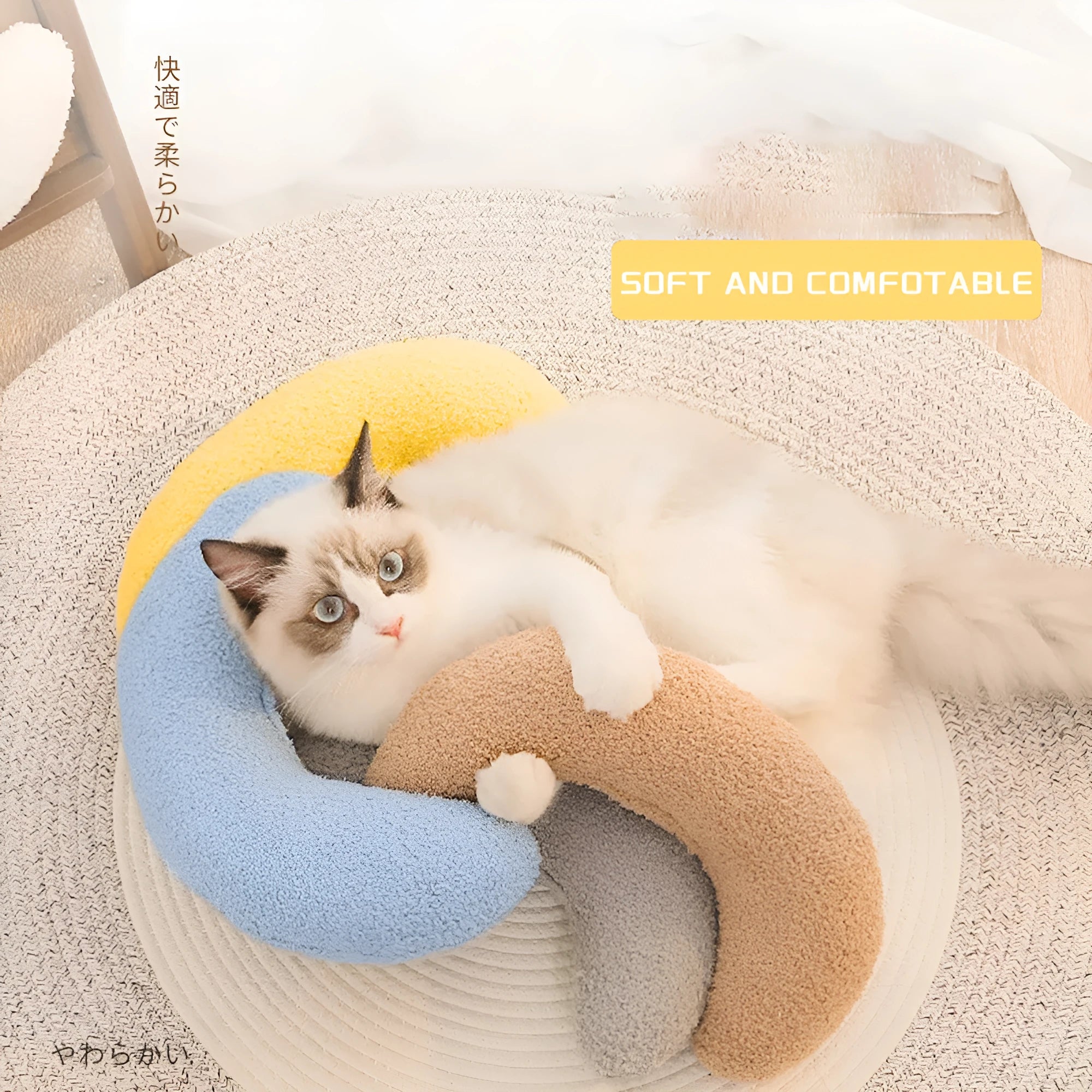 U-shaped blue cat pillow with adjustable white collar for feline cervical support during sleep