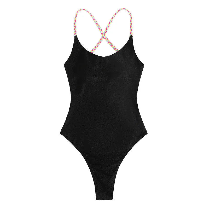 Solid black backless one-piece nylon swimsuit for women with tight fit and high-cut leg