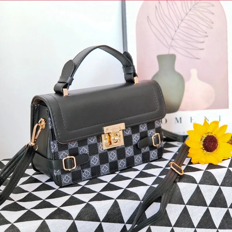 Small square ethnic crossbody bag in apricot PU leather with stitching and plaid patterns.