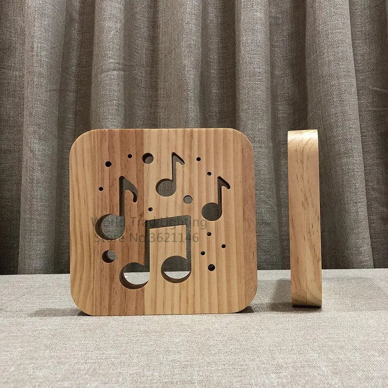 Pine wood cube LED atmosphere lamp with warm white light, showing USB cable and button switch.