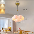 Nordic fish-shaped chandelier with gold iron frame and white bubble lampshades