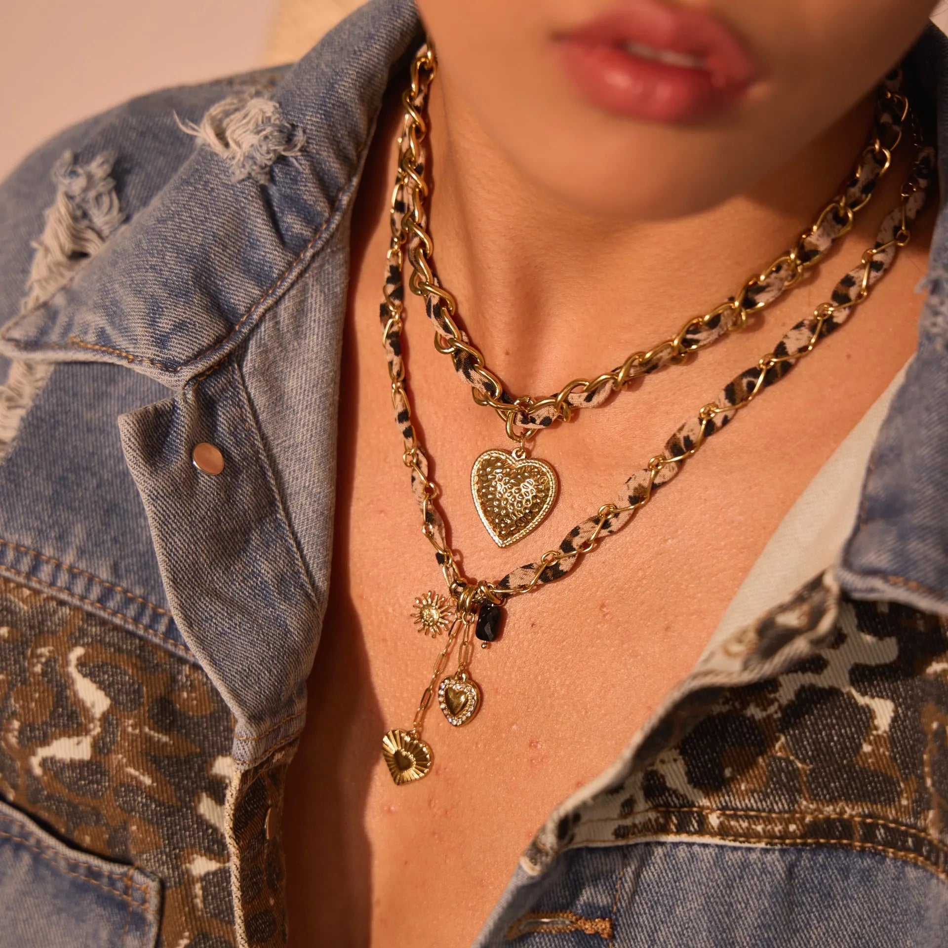 Stainless steel women's necklace with 18K gold electroplating showing geometric pendant design