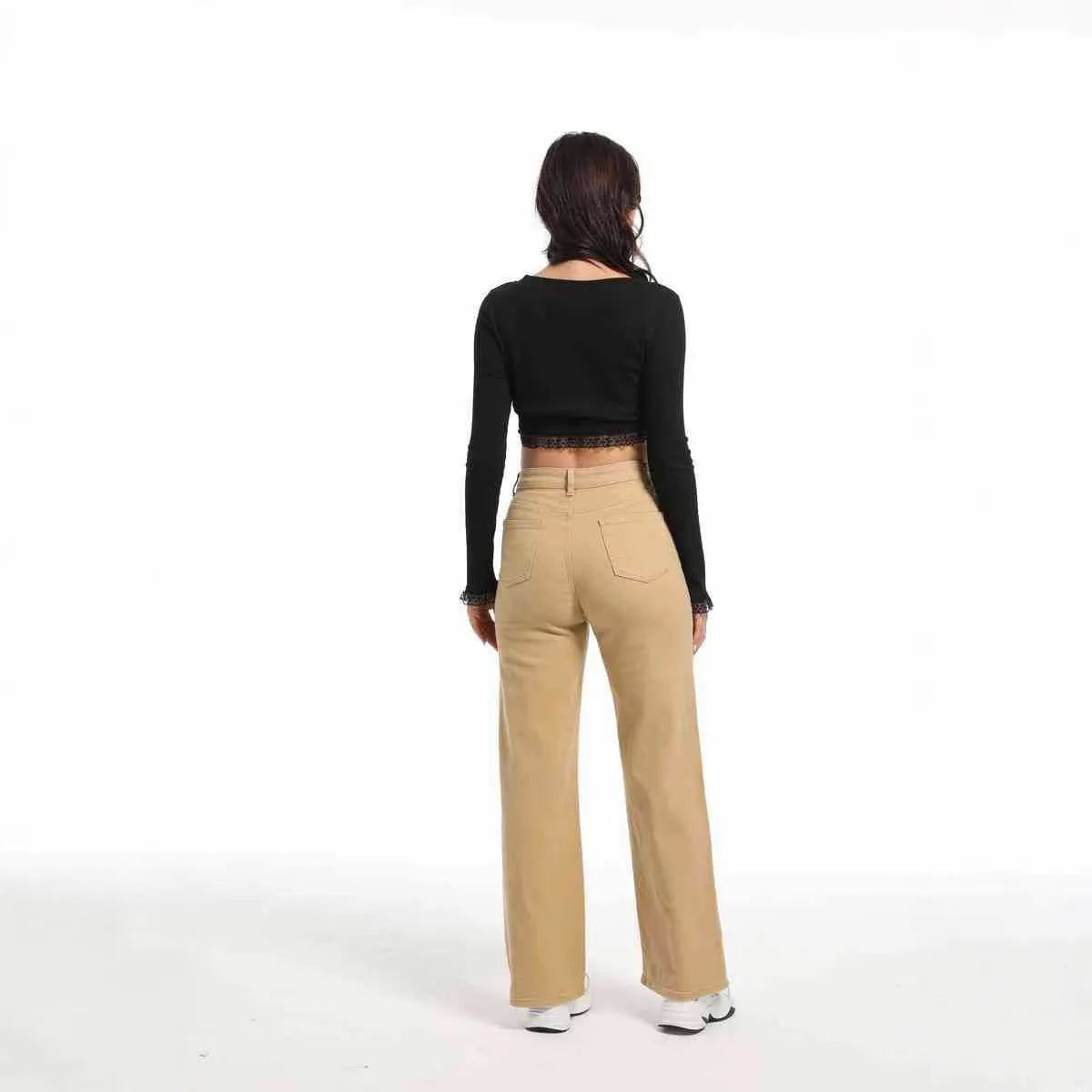 Women's high waist straight leg wide jeans in apricot colour on a hanger.