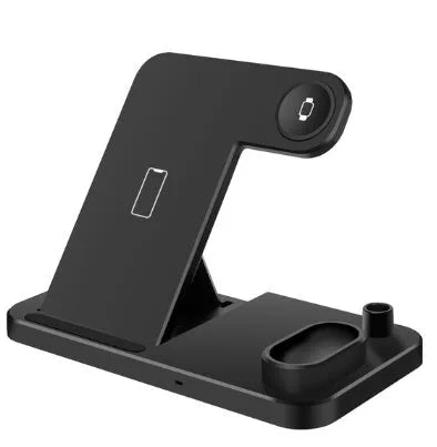 Black 4-in-1 wireless charging station for iPhone, Apple Watch, AirPods and Apple Pencil on a desk