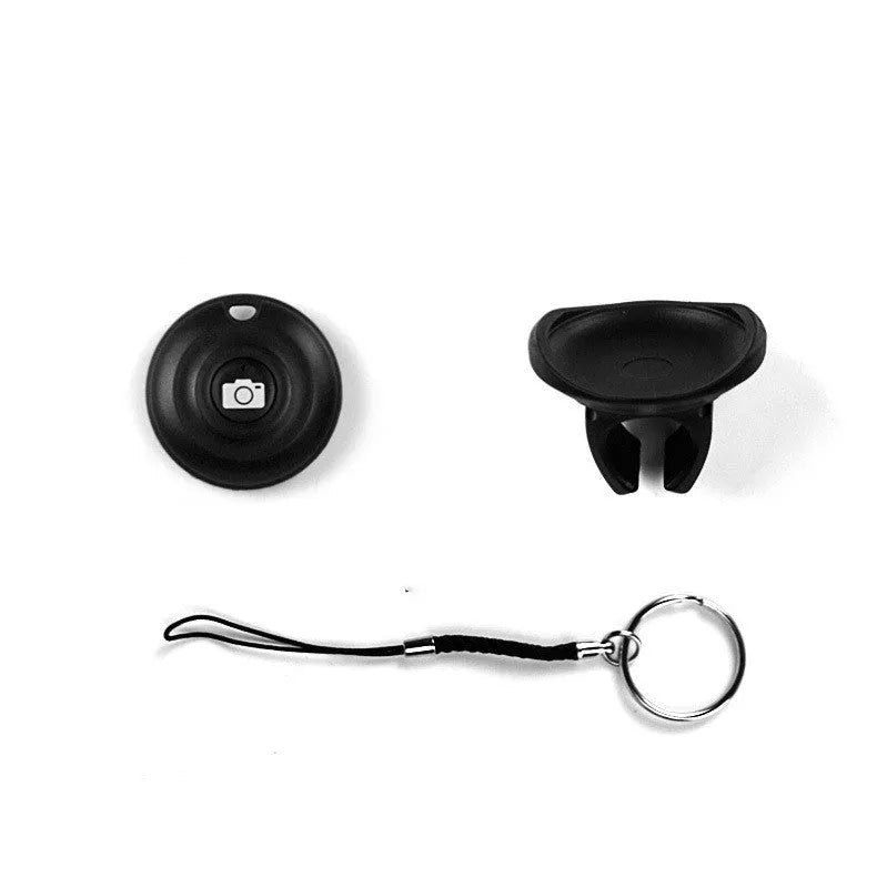 Black Bluetooth remote control for selfies and photography showing compact design
